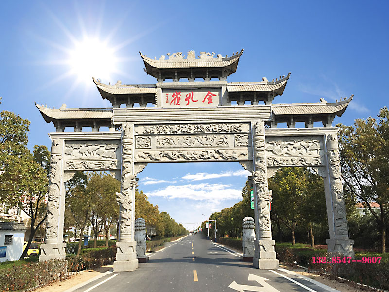 石雕門樓鄉鎮牌樓與石雕單門農村地區經典的雕刻圖片